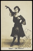 view Leonard Lane, dressed as a woman, dancing. Photographic postcard, 1907.