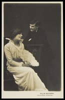 view Willie Manders in drag and in men's attire. Photographic postcard, 1914.