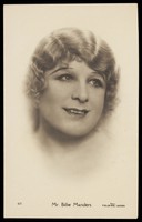 view Billie Manders in drag; vignette portrait. Photographic postcard, 1929.