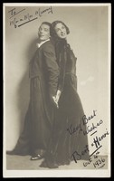 view Bert and Henri, in character; wearing evening dress, one of them in drag. Photographic postcard, 1936.