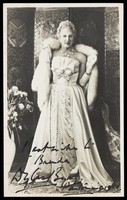 view Douglas Byng in drag during a pantomime. Photograph, 1952.