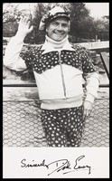view Dick Emery waving in a park. Photograph, 197-.