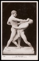 view Actors pose as "The Wrestlers" at the London Pavilion. Photographic postcard, 193-.