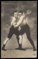 view Two wrestlers facing off. Photographic postcard by Walery, 190-.