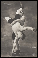 view The wrestler Constant Lavaux "le Boucher" performing a wrestling move on George Hackenschmidt by holding him upside down. Process print after Walery, 190-.
