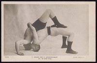 view Ferdinand Gruhn and George Hackenschmidt performing a wrestling move. Process print, 19--.