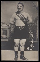 view K. Maisuradze, a wrestler. Photographic postcard, 19--.