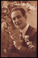 view A man saying through the smoke of his cigarette "Think of me". Photographic postcard, 192- (?).