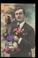 view A man holding Easter eggs and flowers. Coloured photographic postcard, 192-.