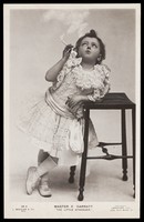 view Edward Garratt in character as "The little stranger". Photographic postcard, 191-.