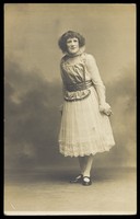 view An actor in pantomime drag. Photographic postcard by Hana Studios, 190-.