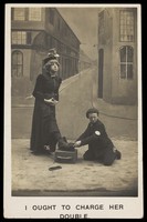 view A shoeshine boy cleans the boots of a man in drag. Photographic postcard, ca. 1905.