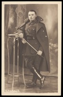 view A young Belgian cavalry officer holding a baton and gloves. Photographic postcard by R. Moraux, 191-.