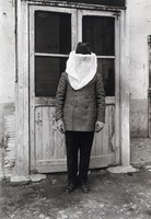 view The anti-malaria school, Nettuno, Italy: a man wearing face-protection and gloves to protect against mosquitos. Photograph, 1918/1937 (?).