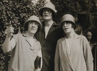 view Women modelling spectacles of unusual shapes. Photograph, 1925.