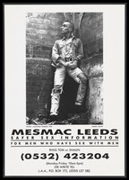 view A man dressed in torn denim jeans and jacket stands against a brick wall with his hand inside his trousers; advertisement for Mesmac Leeds. Lithograph , 1990.