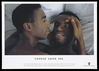 view Two black men lie with their heads together on a pillow; an advertisement for safe sex by the Health Education Authority for the National Aids Helpline. Colour lithograph.