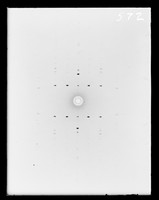 view X-ray diffraction exposure referenced as "X-ray rotation photograph of unknown substance"