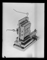 view Photograph of scientific apparatus referenced as "Slit carrier for low angle X-ray camera"