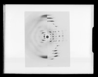 view Composite image of x-ray diffraction exposures of A-type and B-type DNA referenced as "DNA A/B patterns"