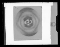 view Copy of a printed photograph of an x-ray diffraction exposure of Li-DNA [Lithium salt DNA] referenced as "Leimans: X-ray diffr. Patt. From DNA"