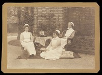 view Sister and two nurses outside Belle Vue House, c 1900