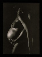 view Directorscut : positive : [pregnant woman with man's arms round her from behind] / photo: Nick Wright.