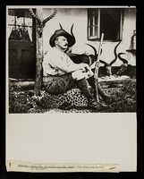 view Print of photograph of David Bruce on the porch of the Bruce's hut in Ubombo, Zululand (now South Africa)