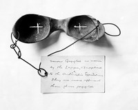 view M0000989: Inside view of a pair of wooden snow goggles, of the kind worn by the Sami people, on display