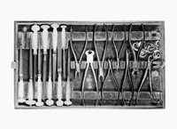 view M0001003: tray of forceps and large files from a dental instrument case