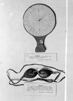 view M0000984: Sundial and snow goggles used in the <i>Discovery</i> Expedition 1902-1904, on display