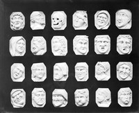 view M0000841: 24 ivory carved plaques of heads and faces