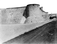 view M0001672: Photograph of the round tower and arch to gateway of the Castle of Chinchón, Spain