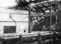 view M0001621: Photograph of the view in a quinine purifying house, showing crystallising troughs for the purified quinine, illustrating the cultivation of cinchona and the production of quinine