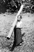 view M0002414: A girl carrying a log, Thailand