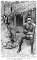 view M0002728: A man, possibly a traditional healer, sat outside a building