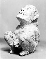 view M0003314: Side view of a statuette of Tlazolteotl, an Aztec goddess of fertility