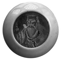 view M0004083: Oval kagamibuta decorated with an image of Shinno, God of Medicine, holding a leaf in his right hand