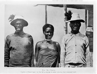 view M0005580: Three Azande people showing their sharpened teeth