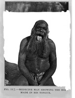 view M0005582: Arrernte man showing the hole made in his tongue, Australia