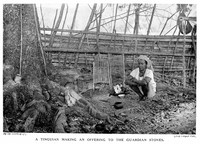 view M0005692: An Itneg person making an offering to the guardian stones