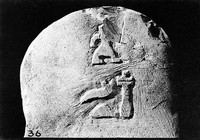 view M0006278: Stele carved with an achondroplastic figure