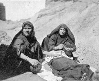 view M0005941EA: Two women undertaking a fertility rite