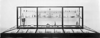 view M0006968: Museum display case of perfume bottles and scents