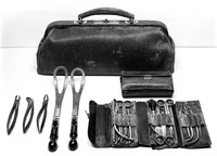 view M0006641: Doctor's bag, with instruments in foreground.