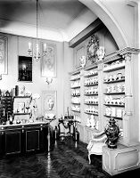 view M0007598: Right interior view of a French pharmacy reconstruction