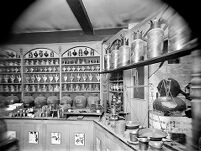 view M0007509: Photograph of the reassembled shop interior of John Bell & Company