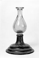 view M0010875: Urn-shaped green glass vessel