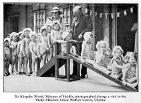 view M0010363EA: Minister of Health at the Violet Melchett Infant Welfare Centre, London, from <i>The nation's health</i>, 1937 / M0010363EB: Frontage of the Ministry of Health, London, from <i>The nation's health</i>, 1937