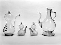 view M0011891: Photograph of four 17th century spouted, glass vessels possibly used for oils and essences